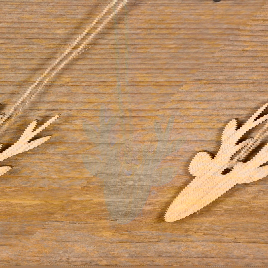 Houten Rendierkopje aan Koordje - Kadopapier.net