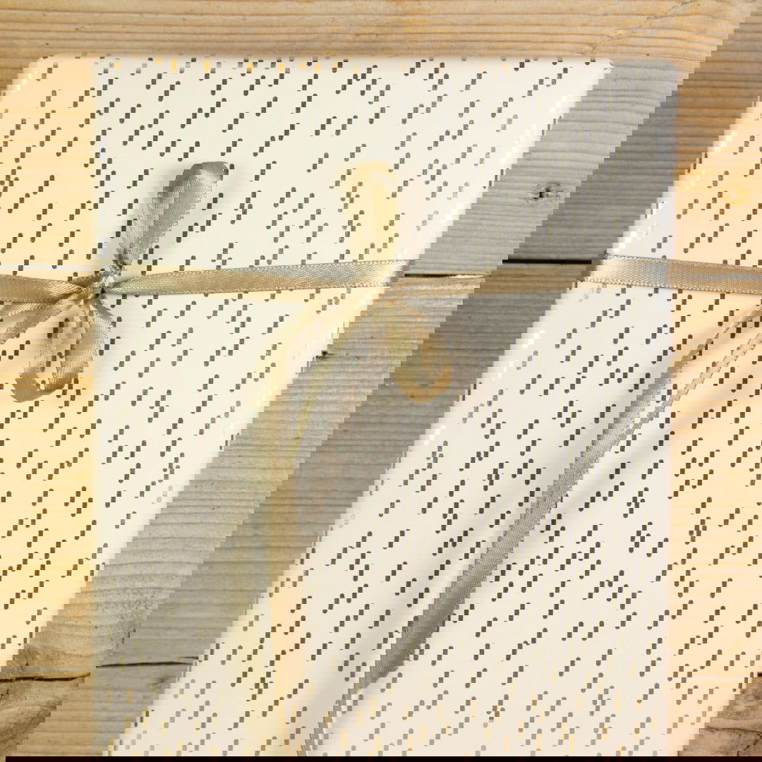 Inpakpapier met hoogglans Streepjes Ivoor - Kadopapier.net