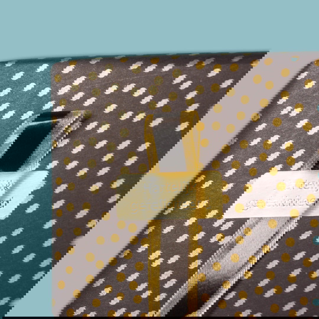 Matzwart Inpakpapier Confetti Dots Goud - Kadopapier.net