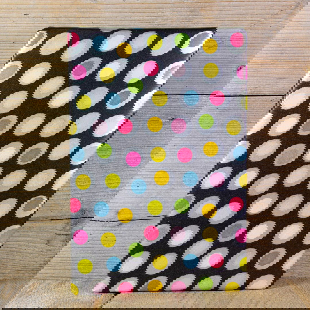 Zwart inpakpapier met stippen - Kadopapier.net